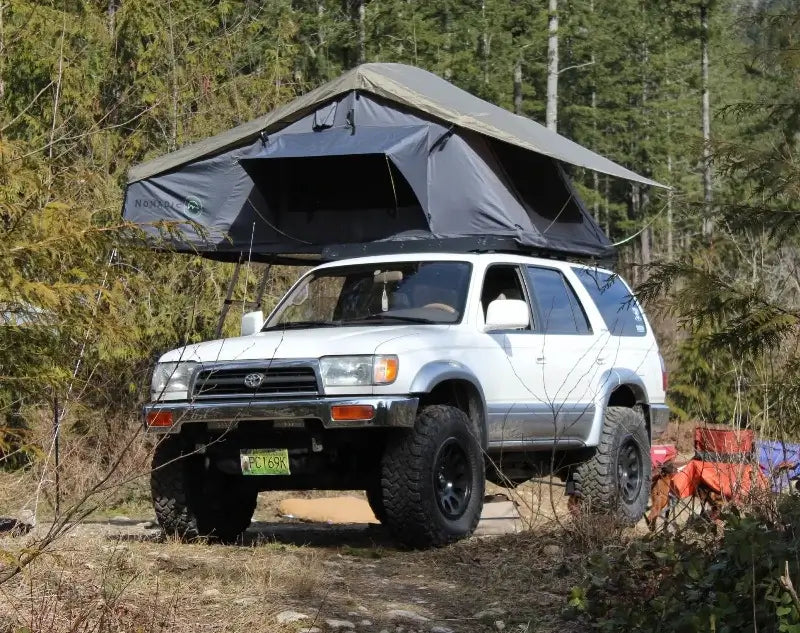 tent over car OVS Nomadic 2 Extended Roof Top Tent with Annex