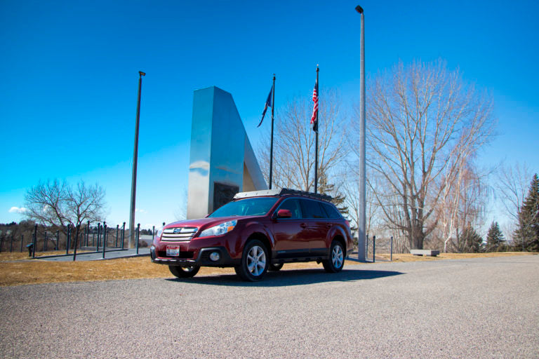 Prinsu 4th Gen Subaru Outback Roof Rack on a red outback