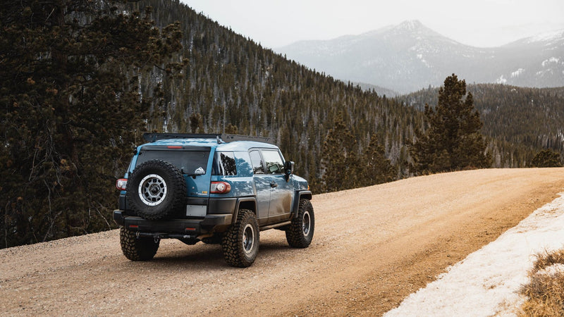 Sherpa Fuji Fj Cruiser Roof Rack on a Light Blue Fj Cruiser in Backcountry