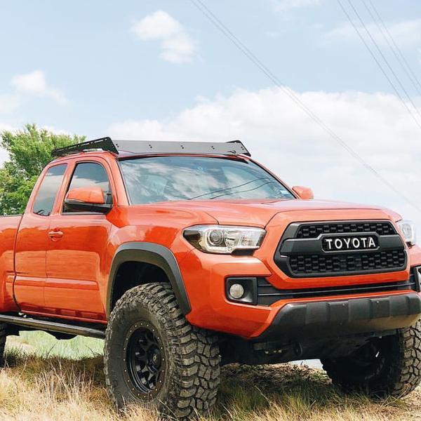 Prinsu Tacoma Access Cab Roof Rack on a red tacoma access cab