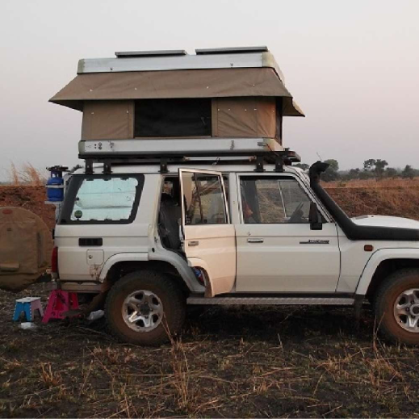 Bundutop Roof Top Tent Mounted White Jeep