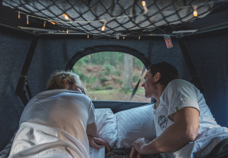 TentBox Classic Roof Top Tent with 2 friends inside