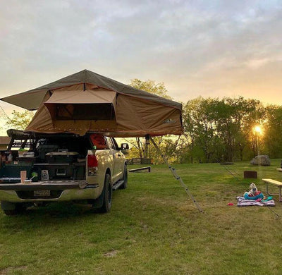 Tuff Stuff Ranger Overland Roof Top Tent in a camping park