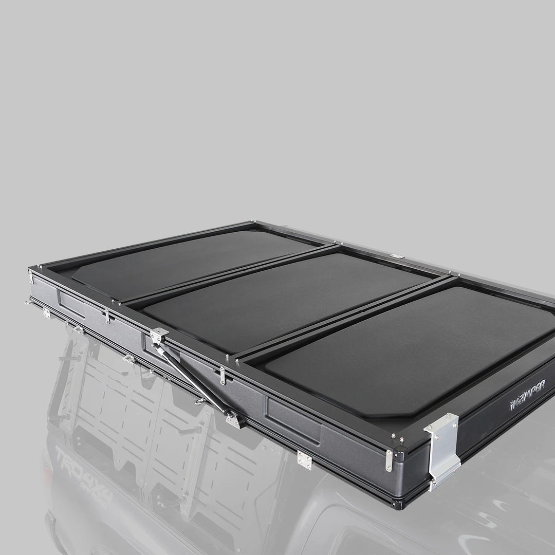 hard shell rooftop tent open camping setup on vehicle