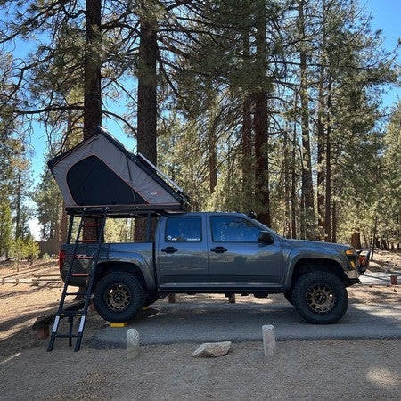 Roofnest Falcon Pro rooftop tent camping in forest