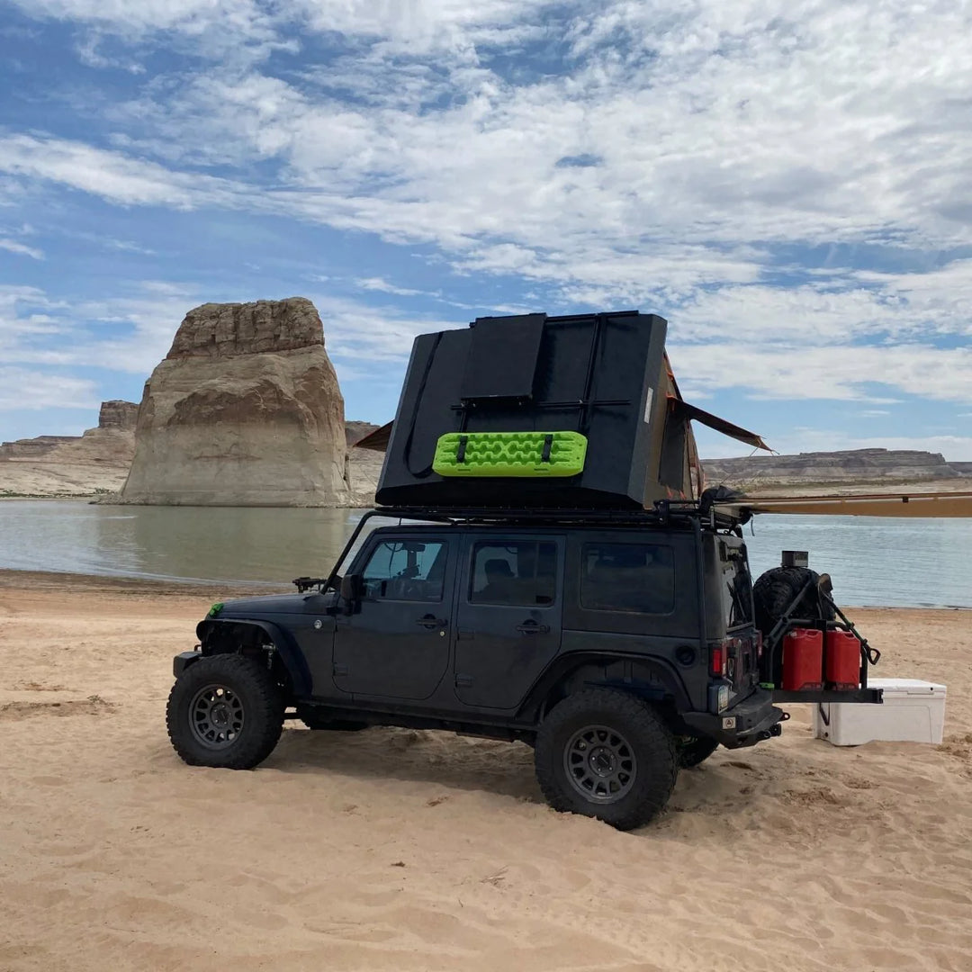 Camping gear rooftop tent setup