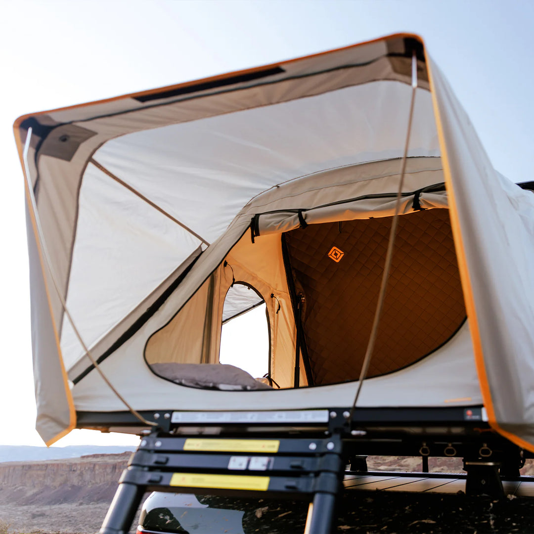 Rivian rooftop tent with ladder