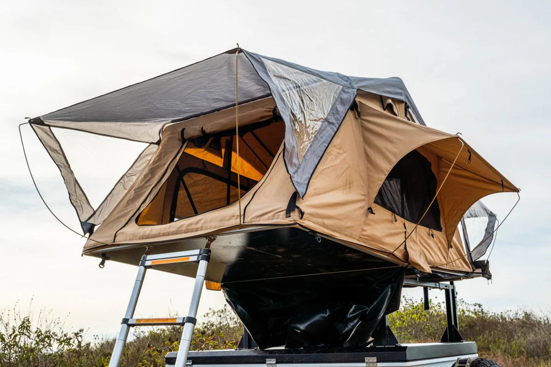 Compact rooftop camping tent