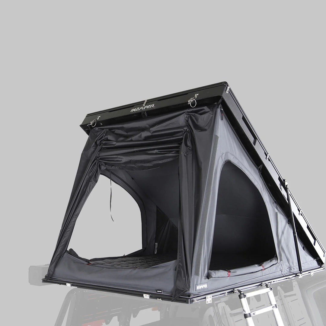 foldable hard shell rooftop tent open view