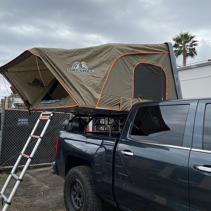Roof tent with secure mounting system