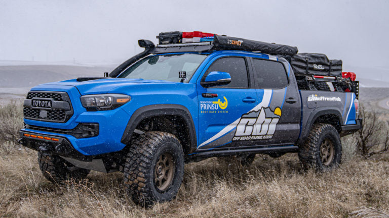 Prinsu Tacoma Double Cab Roof Rack on a blue tacoma with CVT roof top tent