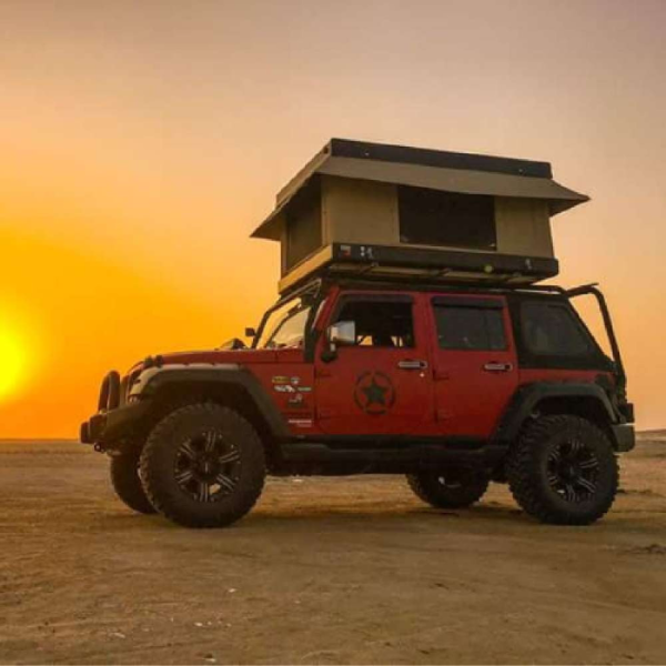 Bundutop Roof Top Tent Mounted on Red Jeep