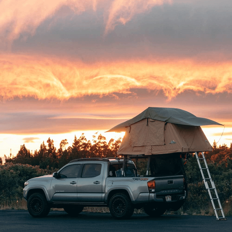 Tuff Stuff Delta Roof Top Tent on Tacoma with orange sky background