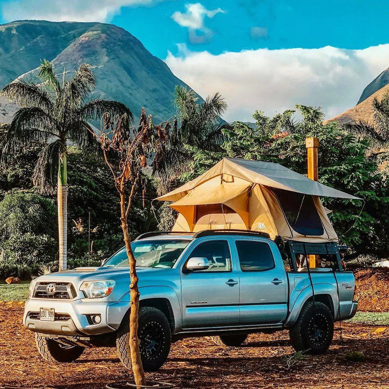 Tuff Stuff Delta Roof Top Tent on a tacoma around nature