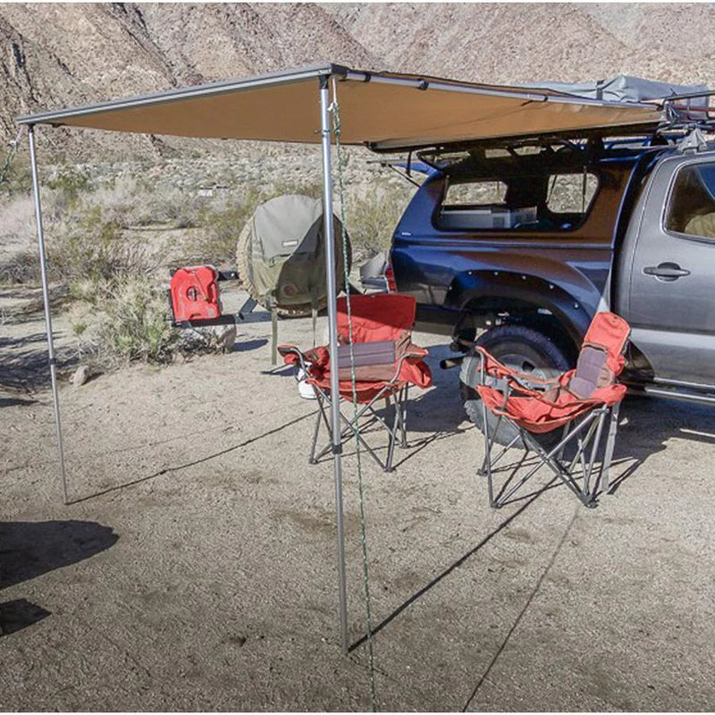 Tuff Stuff Awning with 2 chairs under it